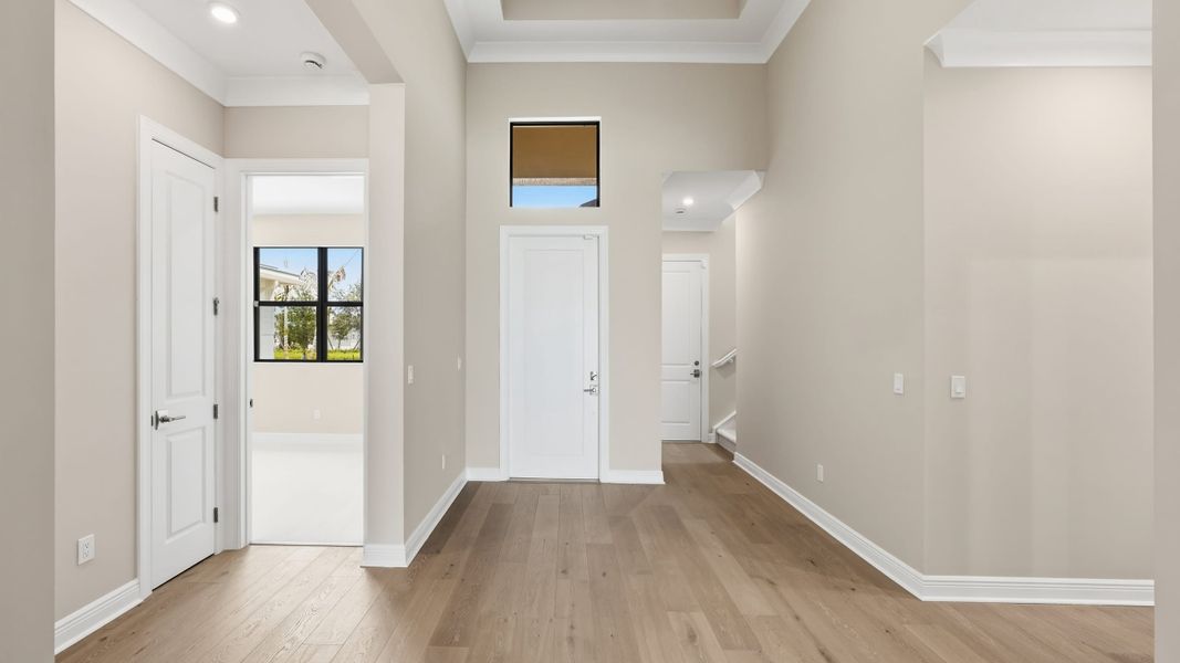 Spacious, unfurnished interior of a new home in PGA Village Verano, Port St. Lucie (Image 19).