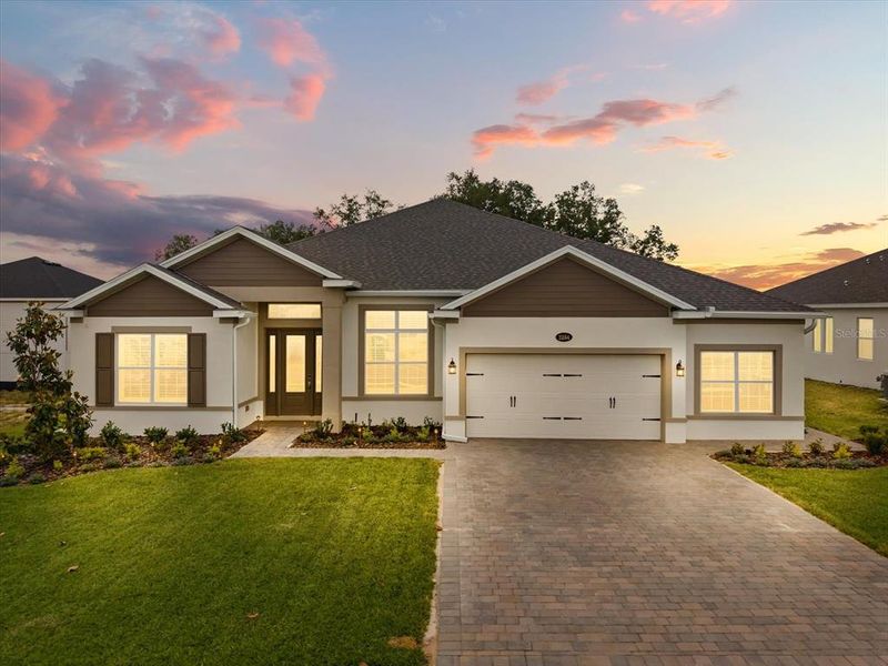 Front exterior of a new home in , Apopka, FL, highlighting curb appeal (Image 23).