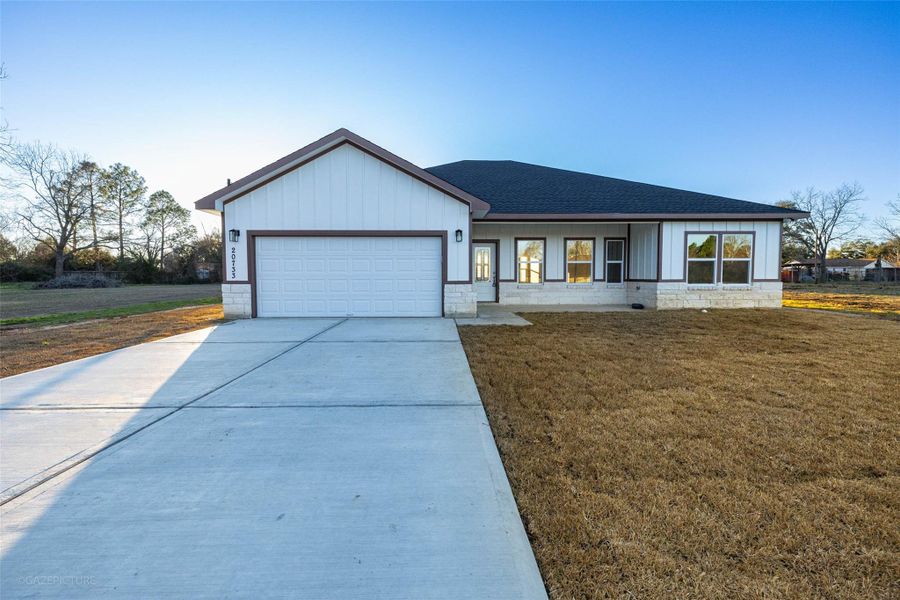 Front exterior of a new home in , Prairie View, TX, highlighting curb appeal (Image 18). Front exterior of a new home in , Prairie View, TX, highlighting curb appeal (Image 18).