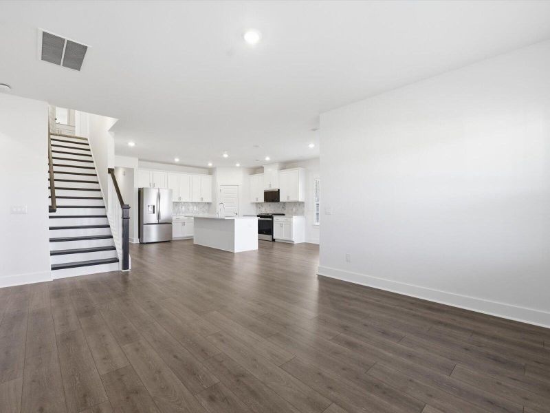 Spacious, unfurnished interior of a new home in The Coves at Lakes of Cane Bay, Summerville (Image 25).