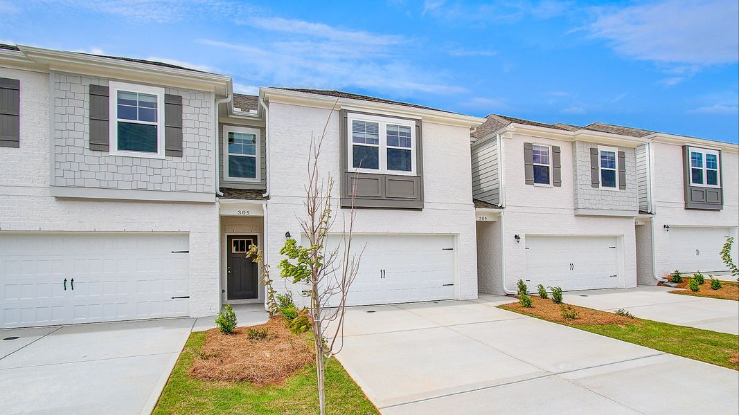 Representative exterior photo of a completed home built from the Austin by DRB Homes in Bowers Farm Townhomes, McDonough, GA (Image 23).