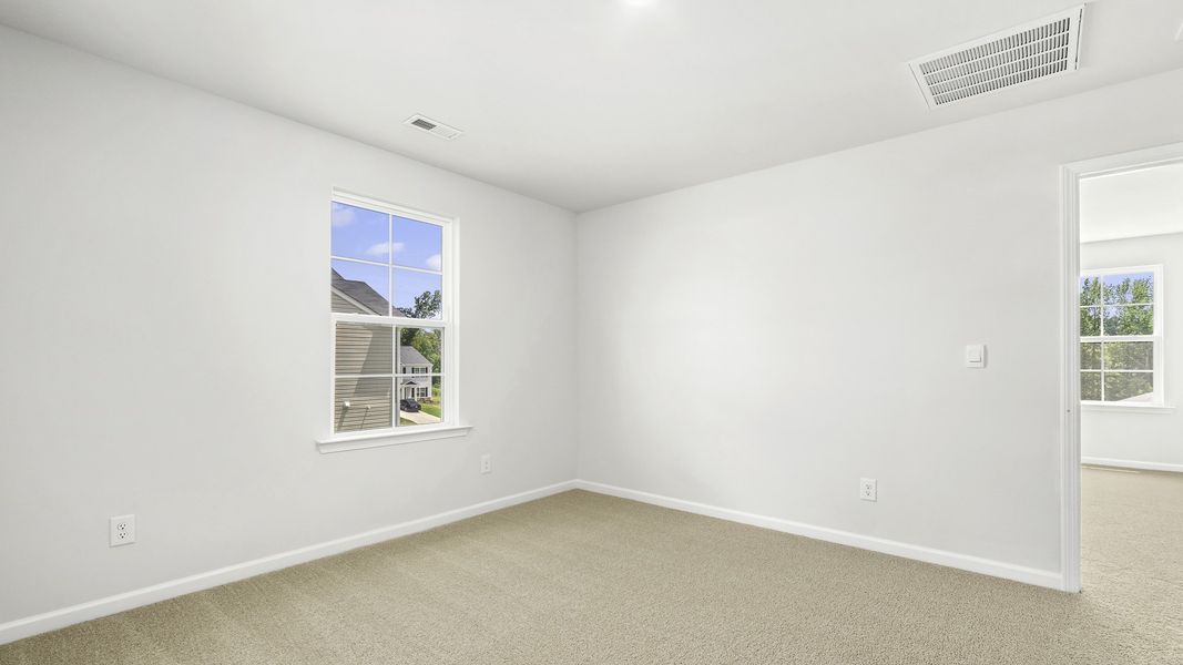 Spacious, unfurnished interior of a new home in English Farm, Archdale (Image 21).