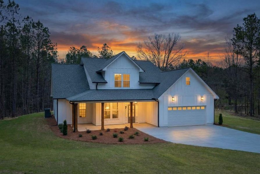 Front exterior of a new home in , Calhoun, GA, highlighting curb appeal (Image 18).
