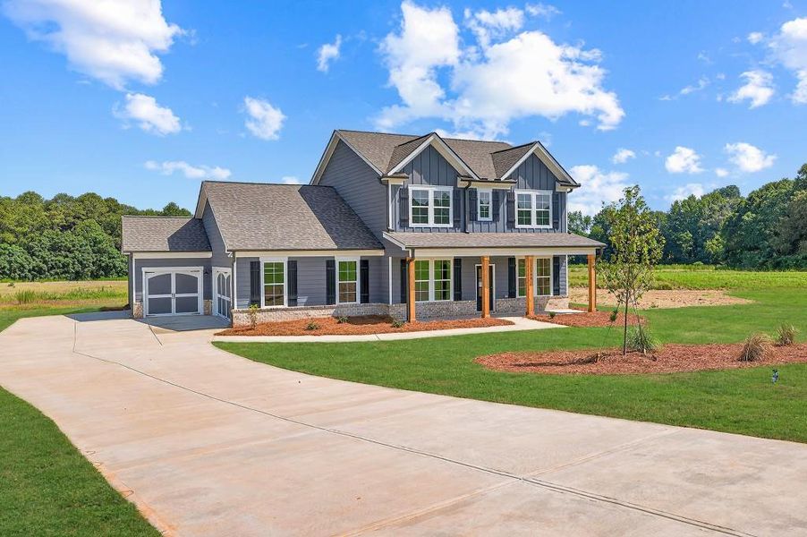 Front exterior of a new home in , Good Hope, GA, highlighting curb appeal (Image 2). Front exterior of a new home in , Good Hope, GA, highlighting curb appeal (Image 2).