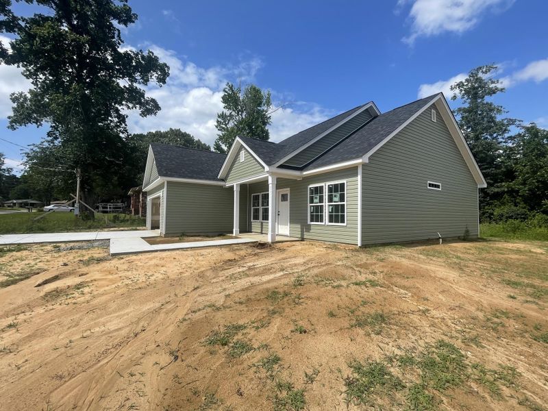 Front exterior of a new home in , Orangeburg, SC, highlighting curb appeal (Image 1).