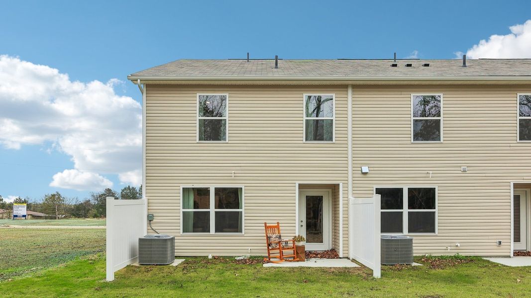 Exterior details and patio area of a home in Saddle Trace Townhomes, Lewisburg (Image 3).