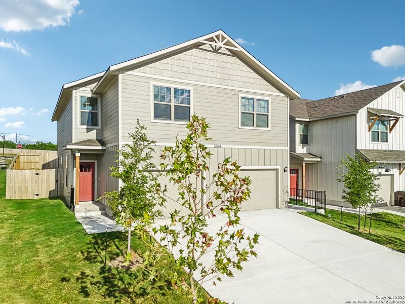 Front exterior of a new home in , San Antonio, TX, highlighting curb appeal (Image 24).