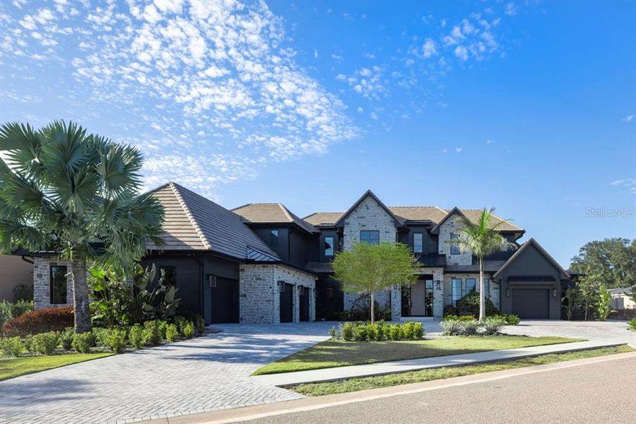 Front exterior of a new home in , Orlando, FL, highlighting curb appeal (Image 25).