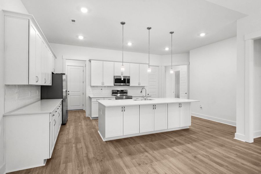 Furnished interior view inside a new home in Long Bay Golf Club, Longs (Image 7).
