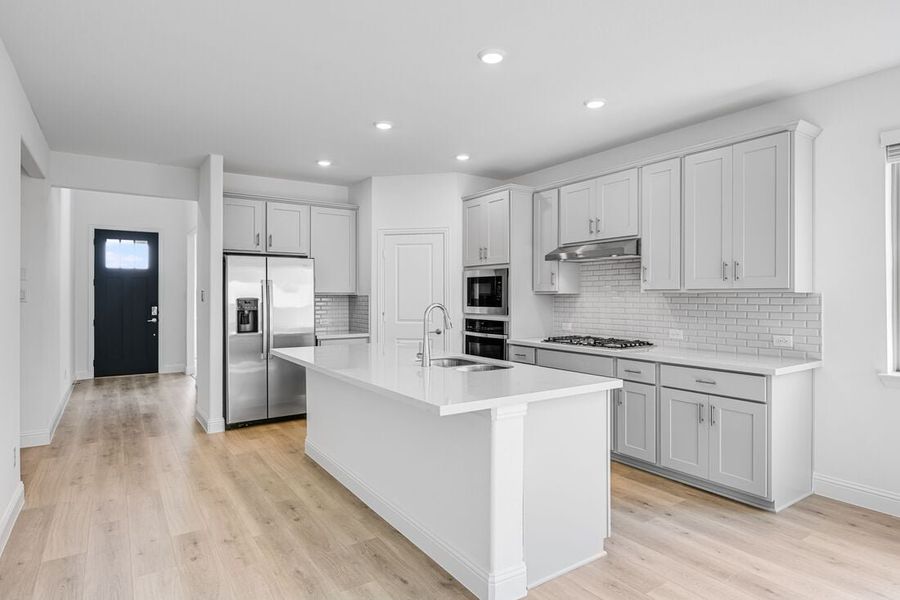 Representative furnished interior of a home built from the Lunaria by Taylor Morrison in Madero 50s, Fort Worth (Image 11).