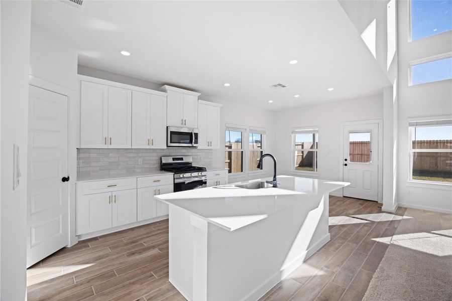 Furnished interior view inside a new home in , Manvel (Image 7).