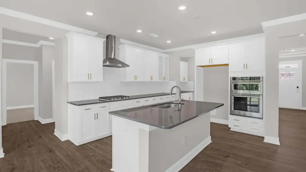 Furnished interior view inside a new home in The Estates Park, Apex (Image 6).