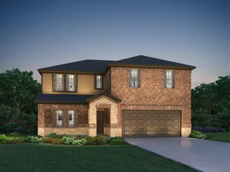 Front exterior of a new home in Stewart's Ranch, Conroe, TX, highlighting curb appeal (Image 1).