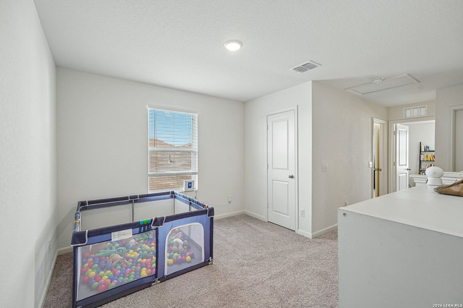 Furnished interior view inside a new home in Hennersby Hollow, San Antonio (Image 15).