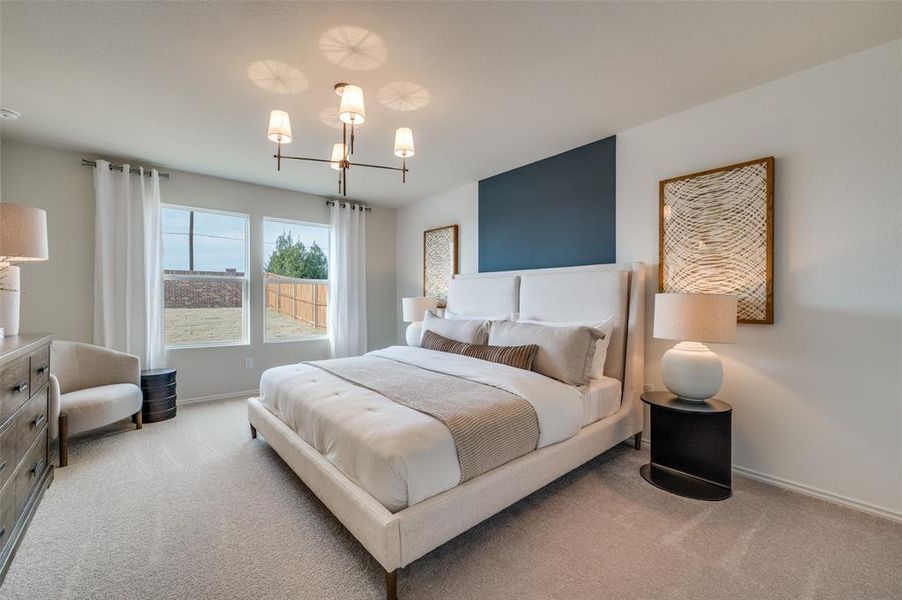 Spacious owner's suite with private bath *Model Representation*