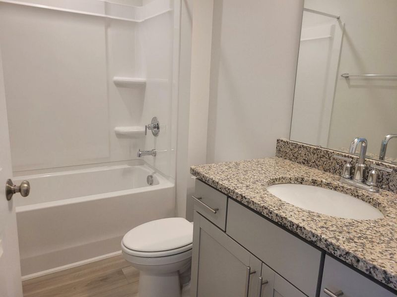 Furnished interior view inside a new home in 1158 Place Townhomes, Wilson (Image 7).