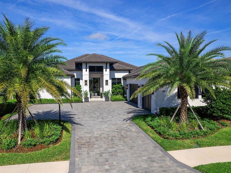 Front exterior of a new home in , Sarasota, FL, highlighting curb appeal (Image 25). Front exterior of a new home in , Sarasota, FL, highlighting curb appeal (Image 25).