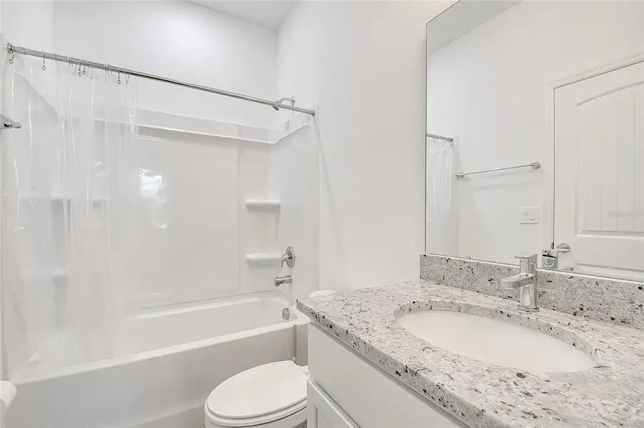 Furnished interior view inside a new home in , Kissimmee (Image 7).