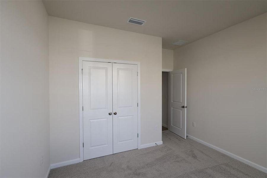 Spacious, unfurnished interior of a new home in Estates at Rivercrest, Sanford (Image 29).
