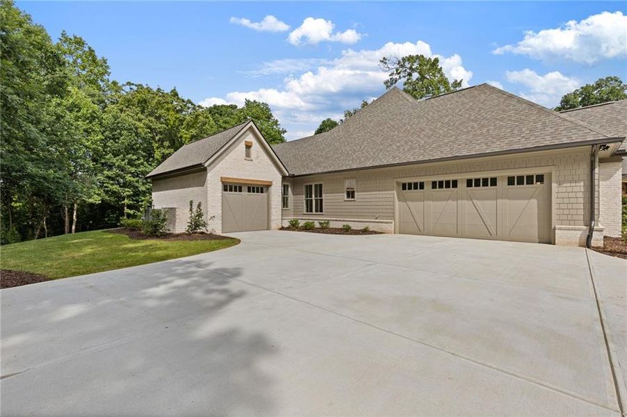 Front exterior of a new home in , Flowery Branch, GA, highlighting curb appeal (Image 33).