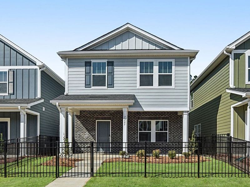 Front exterior of a new home in Nolen Farm, Gastonia, NC, highlighting curb appeal (Image 1). Front exterior of a new home in Nolen Farm, Gastonia, NC, highlighting curb appeal (Image 1).