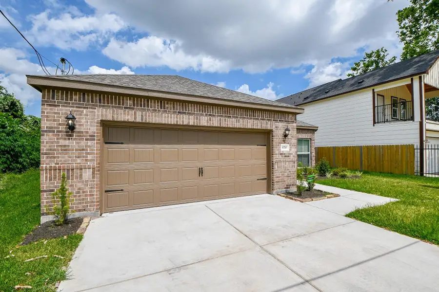 Front exterior of a new home in , Houston, TX, highlighting curb appeal (Image 1). Front exterior of a new home in , Houston, TX, highlighting curb appeal (Image 1).