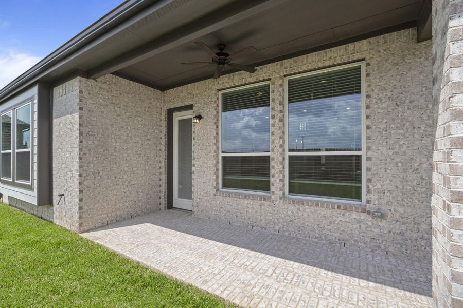 Front exterior of a new home in Wood Leaf Reserve, Tomball, TX, highlighting curb appeal (Image 25).