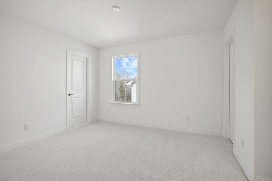 Spacious, unfurnished interior of a new home in Forest Creek, Waxhaw (Image 58).