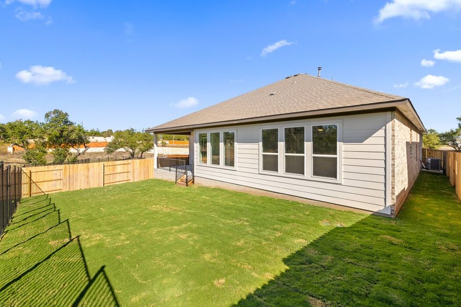 Exterior details and patio area of a home in Capitol Collection at Lariat, Liberty Hill (Image 25). Exterior details and patio area of a home in Capitol Collection at Lariat, Liberty Hill (Image 25).