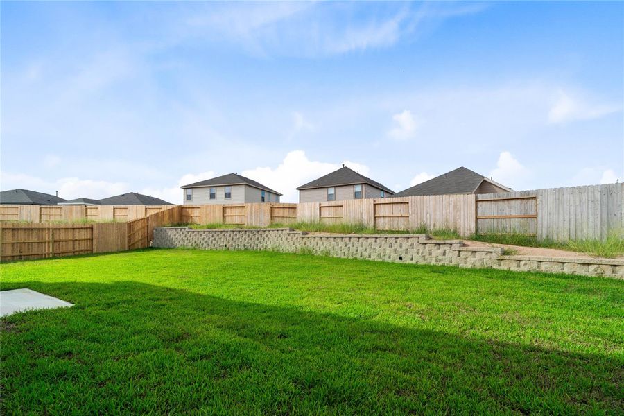 Exterior details and patio area of a home in Oakwood Trails, Tomball (Image 4).