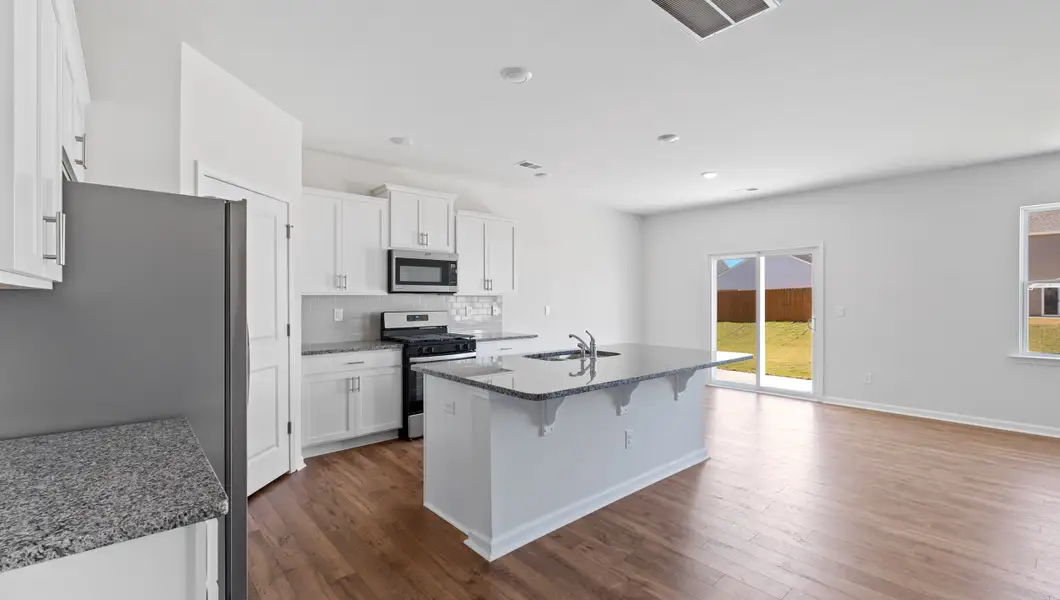 Furnished interior view inside a new home in Durbin Meadows Traditions, Fountain Inn (Image 10).