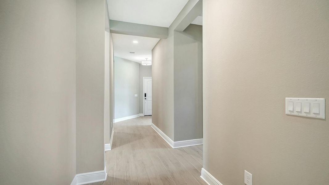 Spacious, unfurnished interior of a new home in Vicenza Real Estate and Homes for Sale in North Venice, FL - Neal Communities, Venice (Image 32).