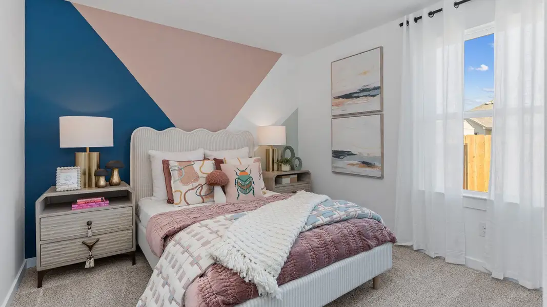 Furnished interior view inside a new home in Caldwell Crossing, Iowa Colony (Image 12).