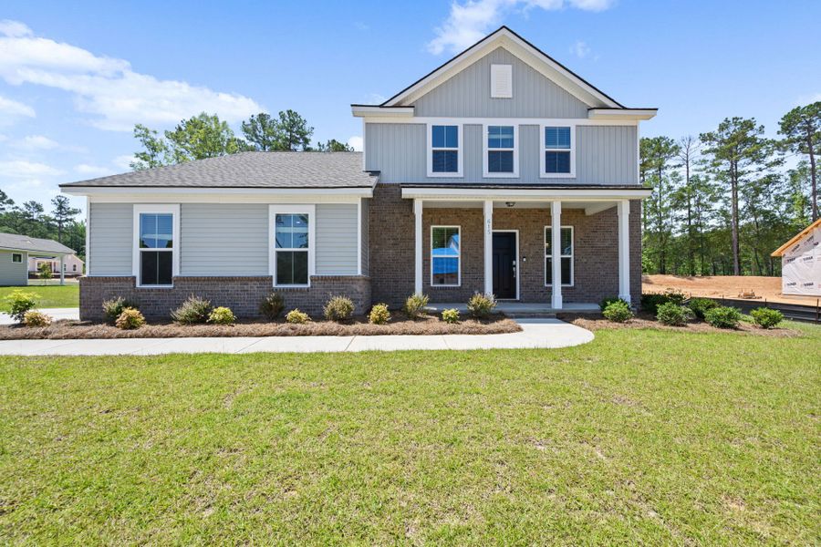 Front exterior of a new home in Oakleaf Chase, Blythewood, SC, highlighting curb appeal (Image 20). Front exterior of a new home in Oakleaf Chase, Blythewood, SC, highlighting curb appeal (Image 20).