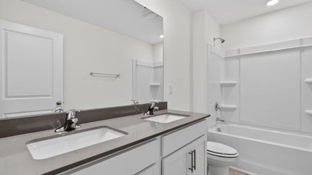 Furnished interior view inside a new home in The Reserve at Prestleigh, Wake Forest (Image 12).
