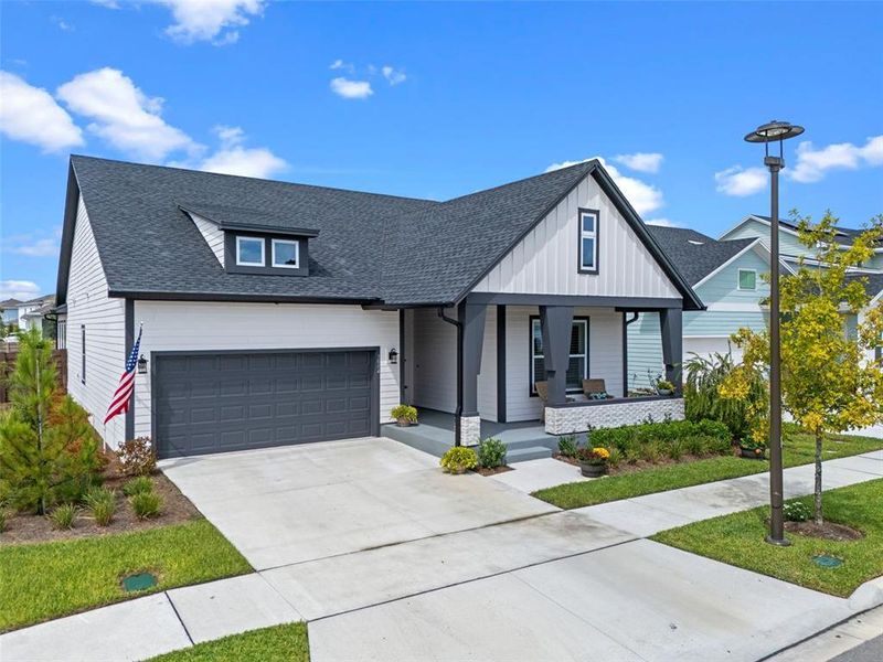 Front exterior of a new home in , St. Cloud, FL, highlighting curb appeal (Image 28).