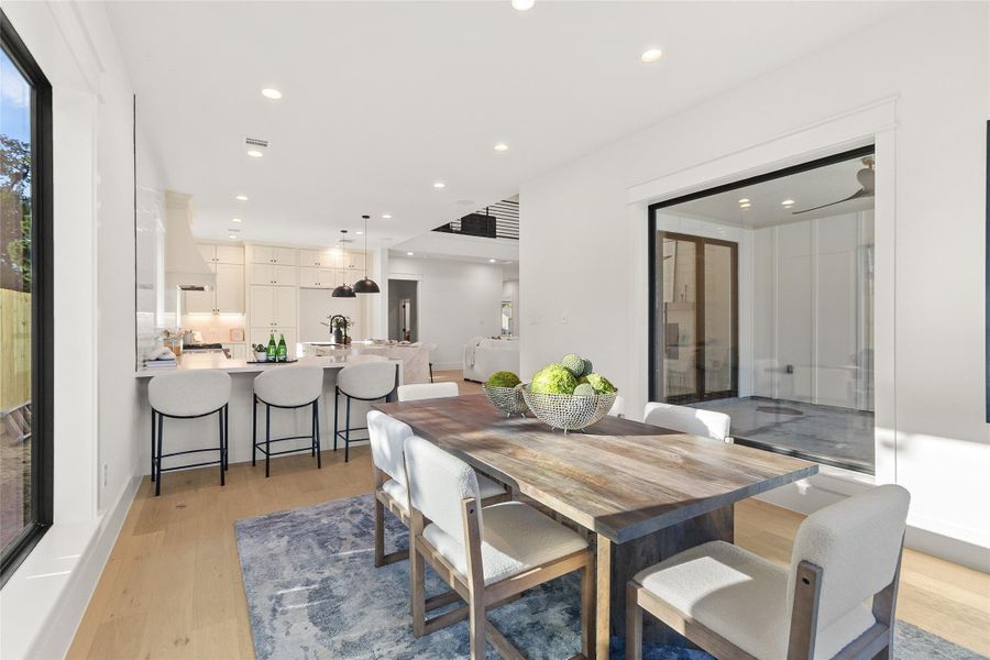 Family dinners and weekend gatherings flow effortlessly between your dining area, gourmet kitchen, and covered outdoor living space.