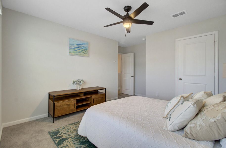 Furnished interior view inside a new home in Sanctuary Cove at Cane Bay, Summerville (Image 19).