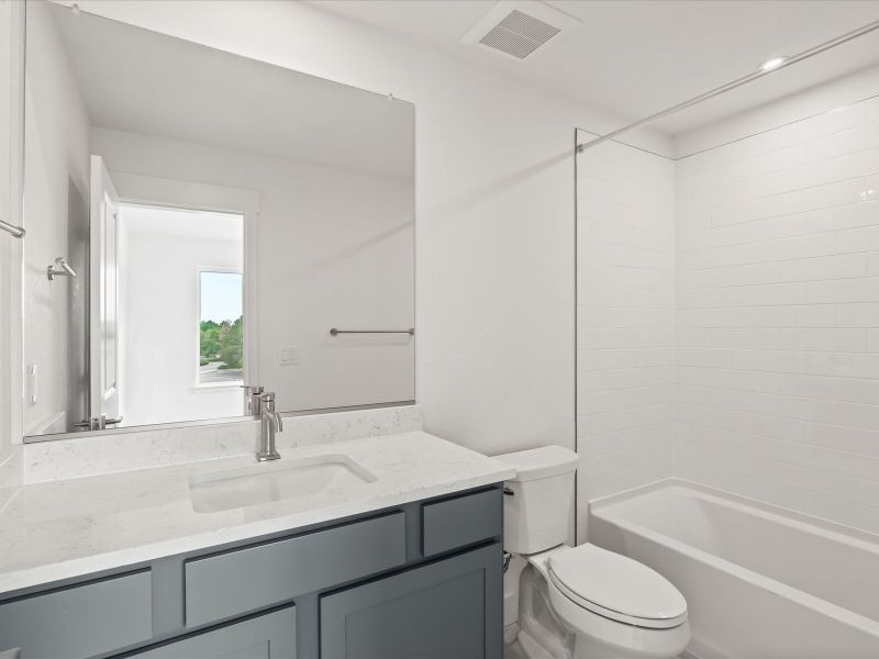 Furnished interior view inside a new home in Ascent at Inverness, Englewood (Image 13).