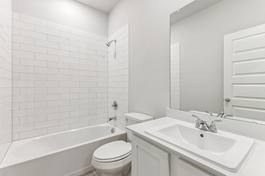 Bathroom in the Wimbledon home plan by Trophy Signature Homes – REPRESENTATIVE PHOTO Bathroom in the Wimbledon home plan by Trophy Signature Homes – REPRESENTATIVE PHOTO