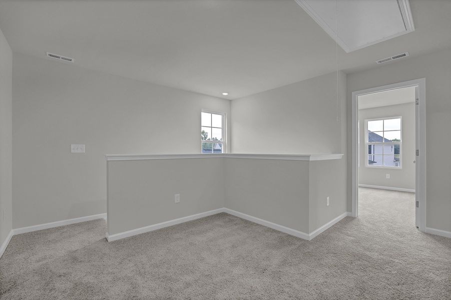 Spacious, unfurnished interior of a new home in River Tide Farms, Bolivia (Image 20).