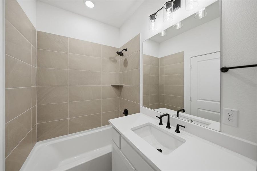 Furnished interior view inside a new home in Light Farms Graham/Reagan, Celina (Image 13).