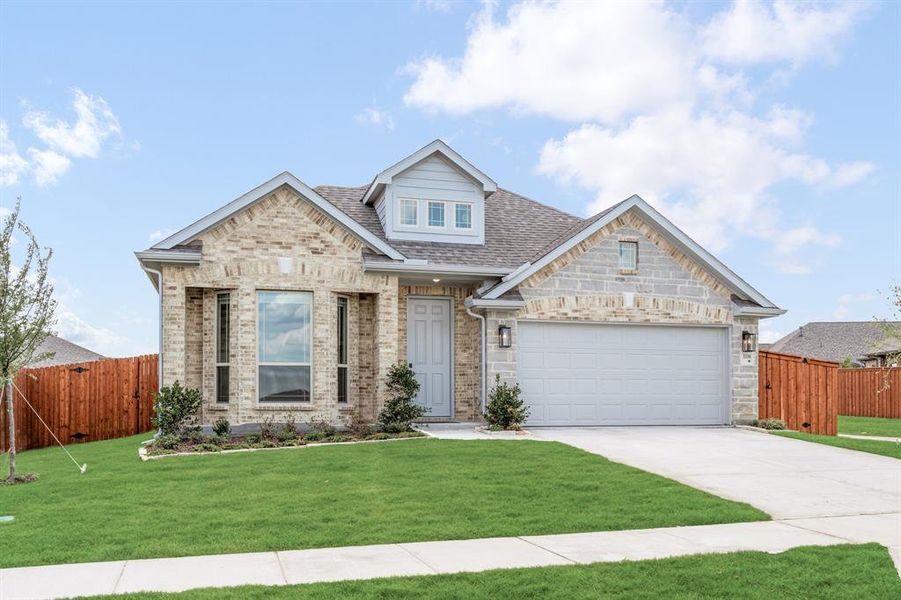 Front exterior of a new home in Heartland Classic 60, Crandall, TX, highlighting curb appeal (Image 25).