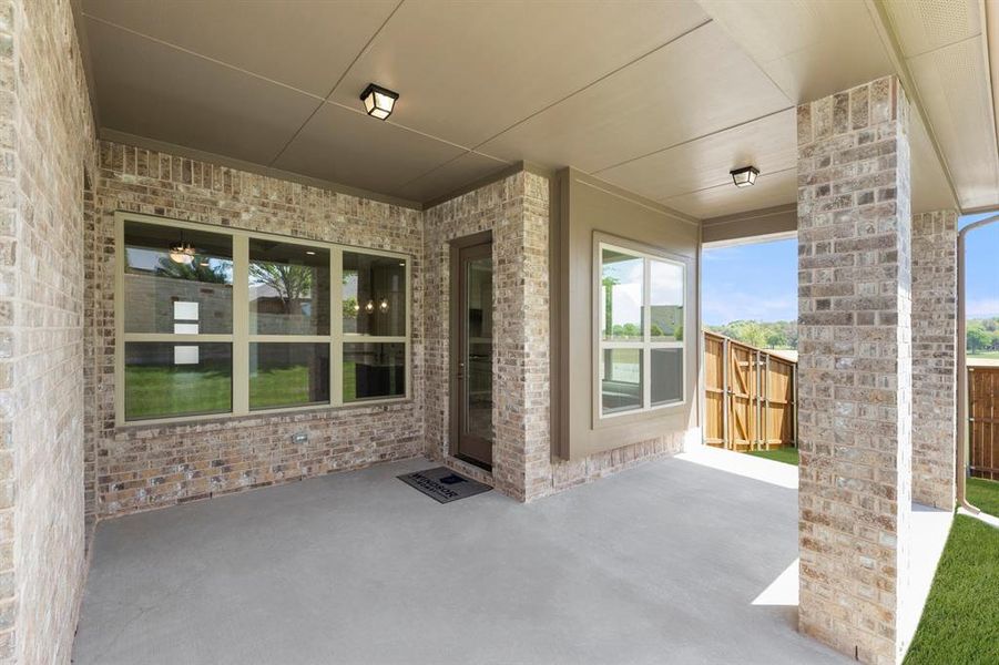 Exterior details and patio area of a home in Providence Cove, McKinney (Image 21).