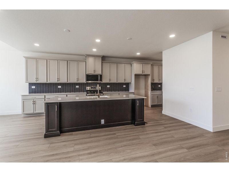 Furnished interior view inside a new home in Prairie Song Story Collection - Single Family Homes, Windsor (Image 15).