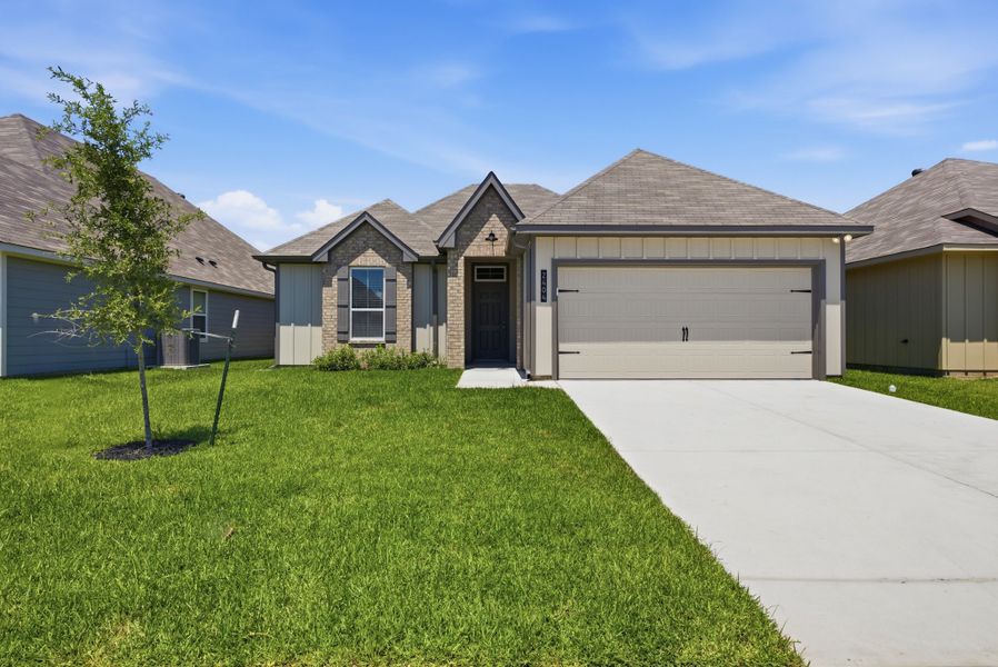 Front exterior of a new home in Pleasant Hill, Bryan, TX, highlighting curb appeal (Image 1). Front exterior of a new home in Pleasant Hill, Bryan, TX, highlighting curb appeal (Image 1).