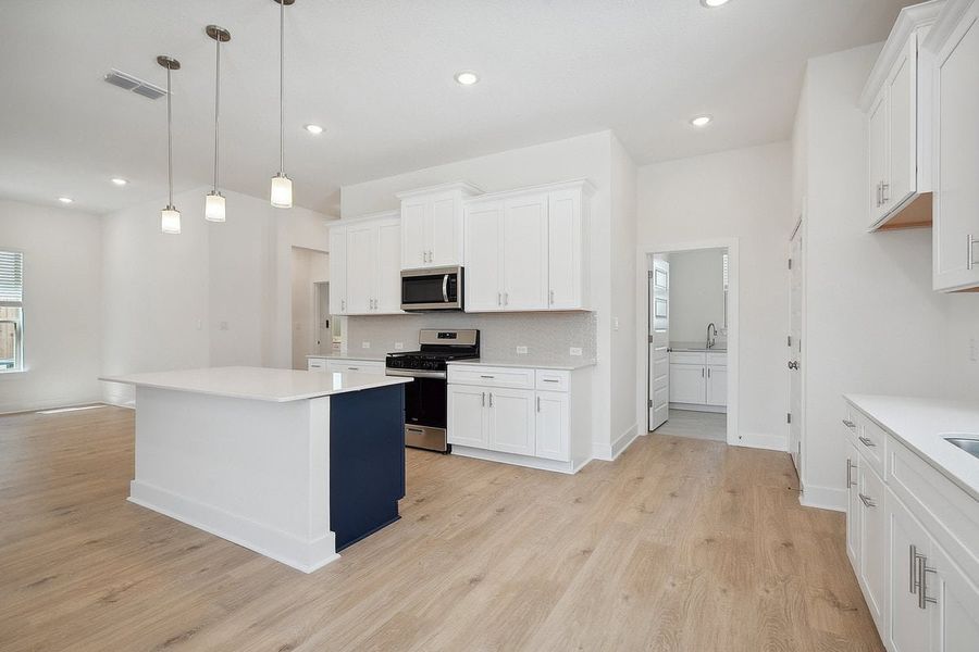 Furnished interior view inside a new home in Sage Hollow, Kyle (Image 8). Furnished interior view inside a new home in Sage Hollow, Kyle (Image 8).