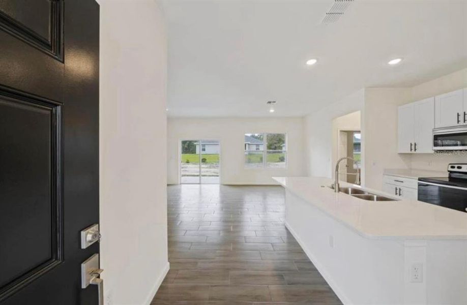 Furnished interior view inside a new home in , Ocala (Image 10).