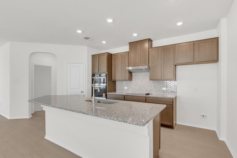 Furnished interior view inside a new home in Retreat at San Gabriel, Georgetown (Image 6).