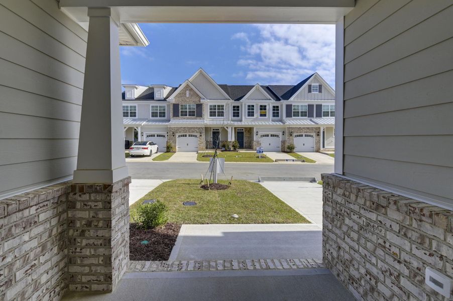 Exterior details and patio area of a home in Lake Carolina Townhomes, Columbia (Image 4).